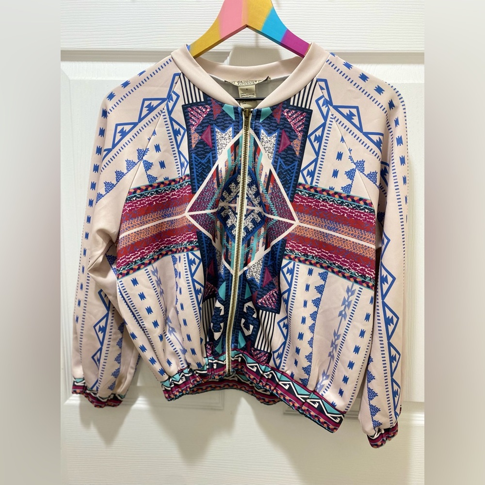 Beautiful lightweight jacket with unique design, small size.